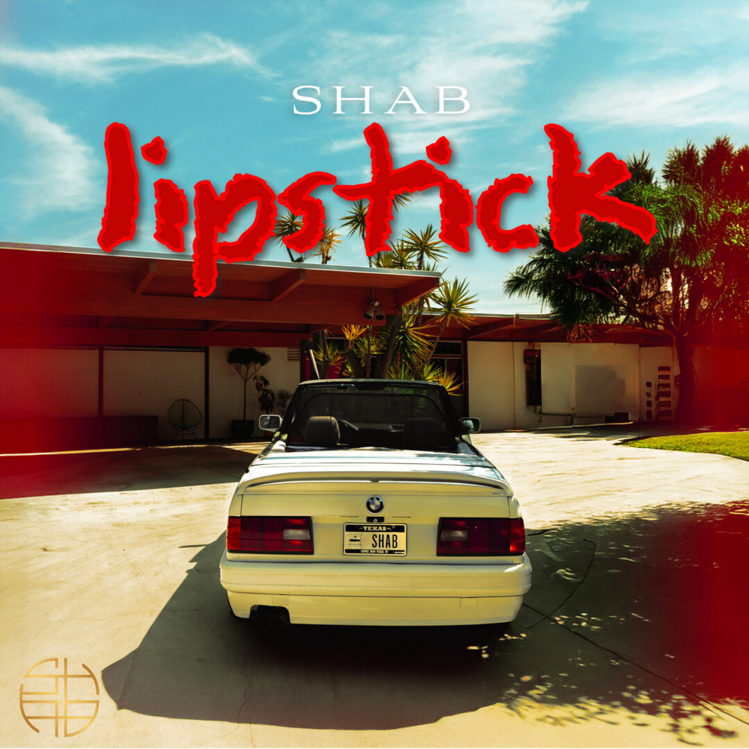 Album cover: white convertible, red "lipstick" text